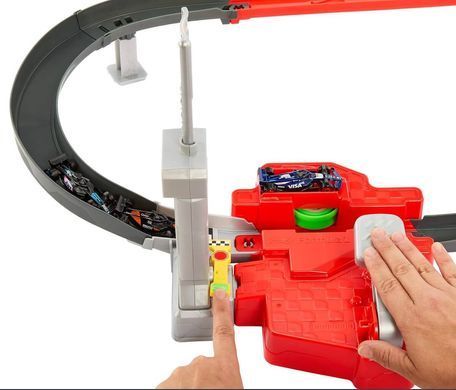 ​Ігровий набір Hot Wheels Траса для перегонів Формули 1 (JDY15) &ndash; фото товару Hot Wheels з категорії Треки і набори Хот Вілс - Hot Wheels. Оригінал, доставка по Україні